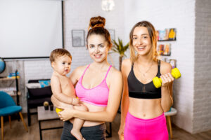 women fitness partners and baby